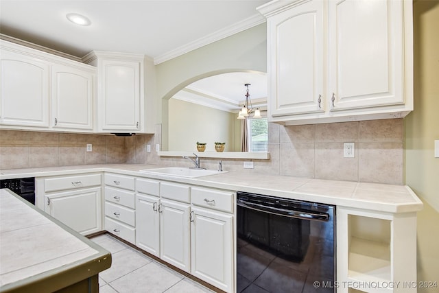 2116 E 59th Pl Unit 4F, Tulsa, OK 74105 - kitchen featuring dishwasher, ornamental molding, light countertops, arched walkways, and backsplash