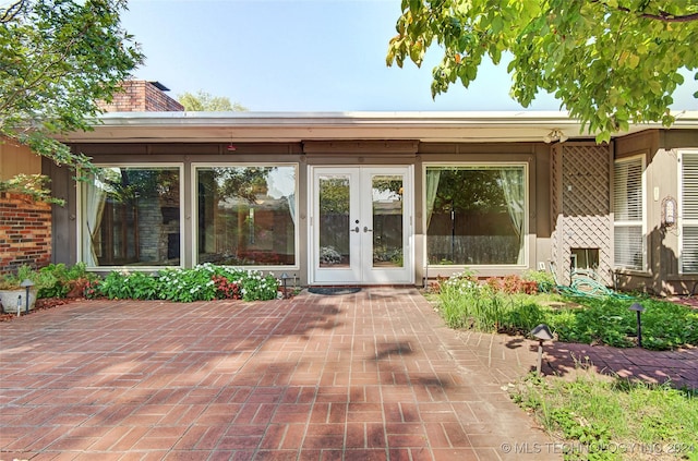 2116 E 59th Pl Unit 4F, Tulsa, OK 74105 - view of patio with french doors
