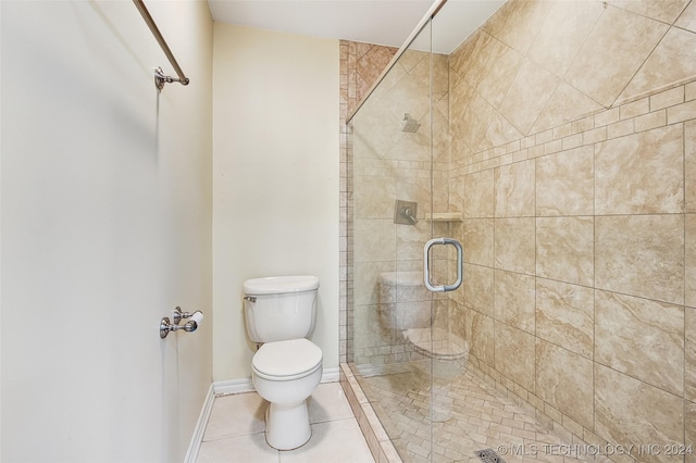 2116 E 59th Pl Unit 4F, Tulsa, OK 74105 - bathroom featuring a shower stall and tile patterned flooring