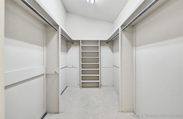2116 E 59th Pl Unit 4F, Tulsa, OK 74105 - walk in closet featuring light carpet