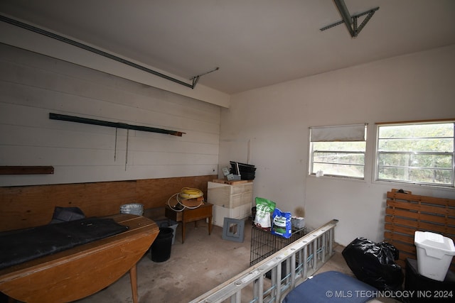 garage with wood walls