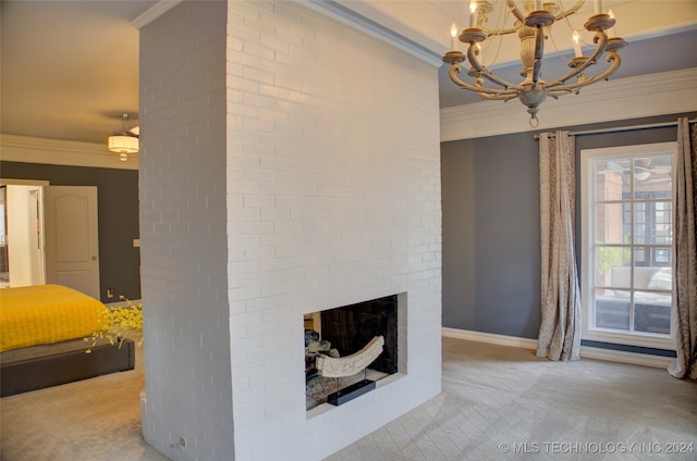 living room featuring crown molding, an inviting chandelier, light carpet, and a fireplace