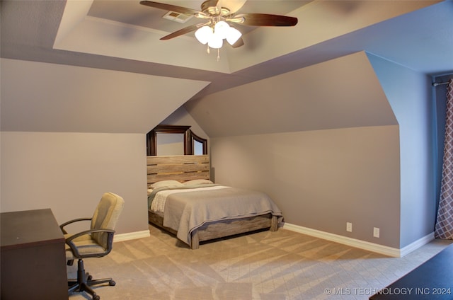 carpeted bedroom featuring lofted ceiling and ceiling fan