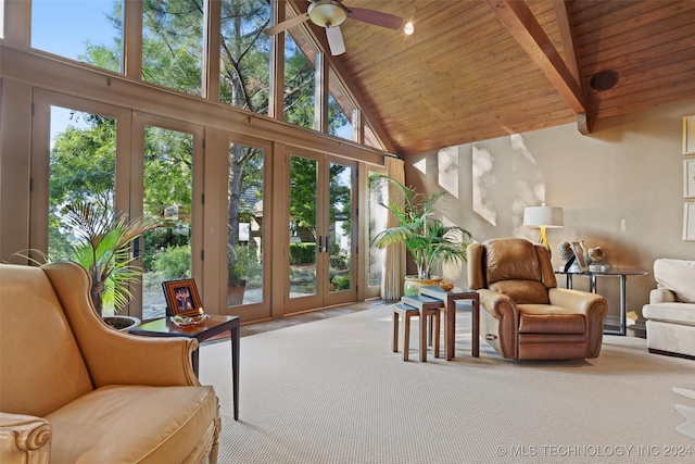 carpeted living room with high vaulted ceiling, ceiling fan, and wood ceiling