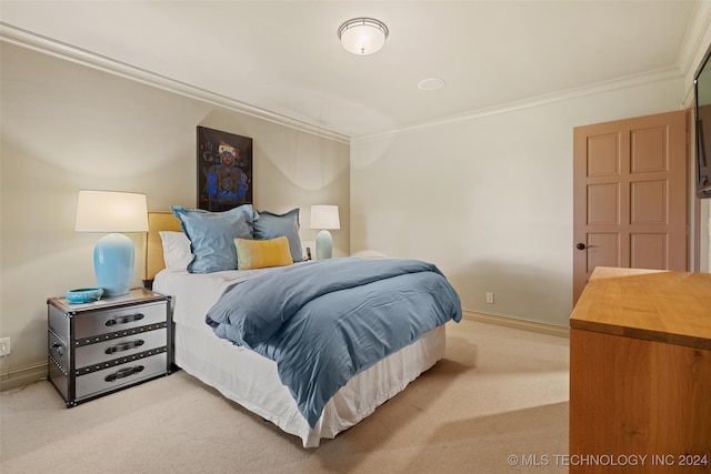 bedroom featuring carpet and crown molding