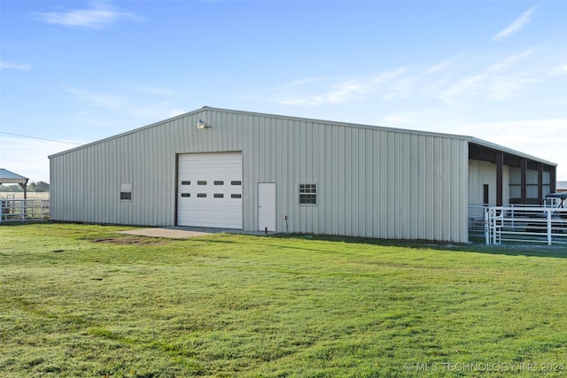 garage featuring a yard