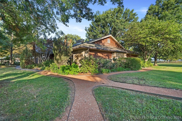 view of front of house with a front lawn