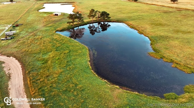 bird's eye view featuring a rural view and a water view