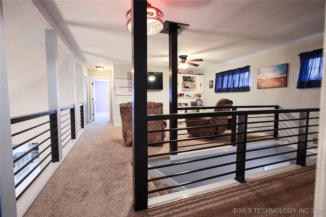 corridor with carpet flooring