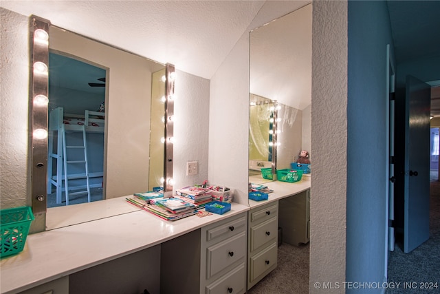 bathroom featuring vanity and a textured ceiling