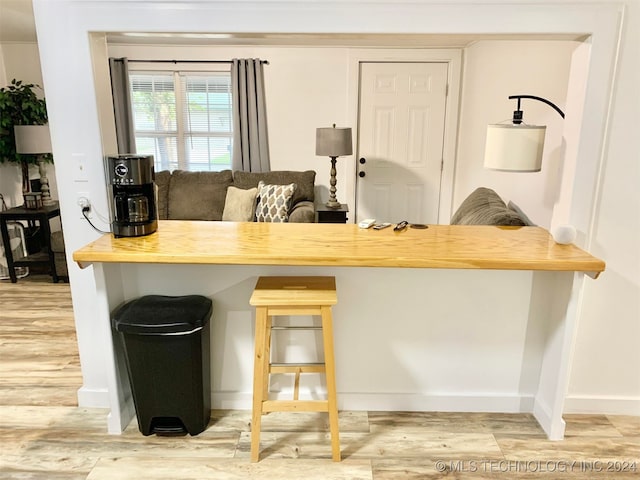 kitchen featuring hardwood / wood-style floors