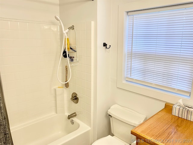 full bathroom featuring vanity, toilet, shower / bath combination with curtain, and plenty of natural light