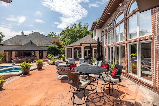 view of patio featuring a gazebo