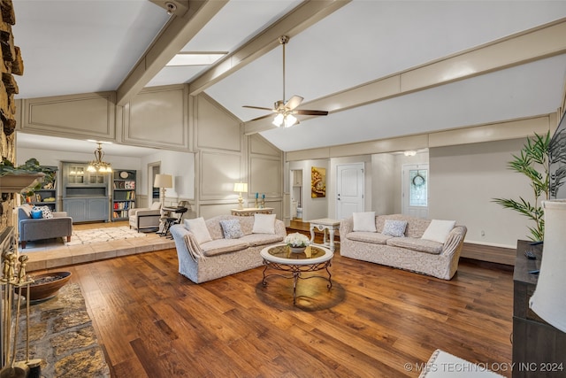 living room featuring wood-type flooring, a skylight, ceiling fan with notable chandelier, beamed ceiling, and high vaulted ceiling