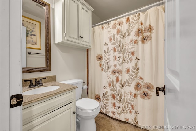 bathroom with walk in shower, vanity, toilet, and tile patterned flooring