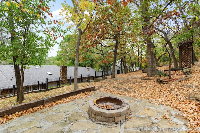 view of patio featuring an outdoor fire pit