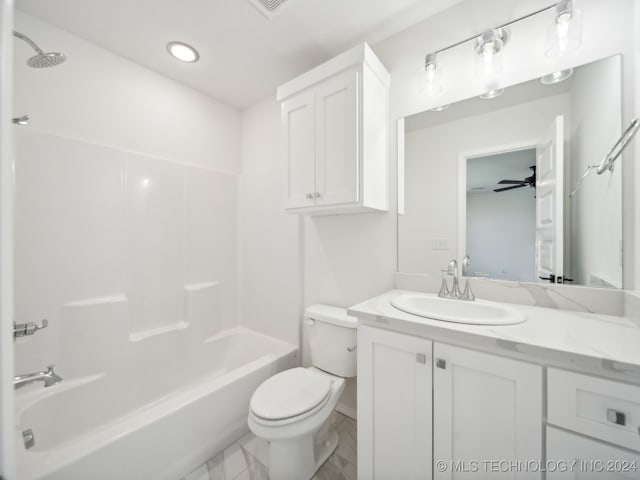 full bathroom featuring bathtub / shower combination, vanity, toilet, and ceiling fan