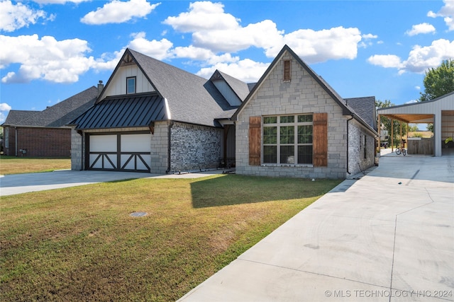 view of front facade featuring a garage and a front yard