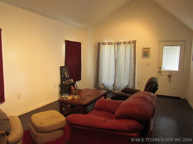 living room featuring lofted ceiling