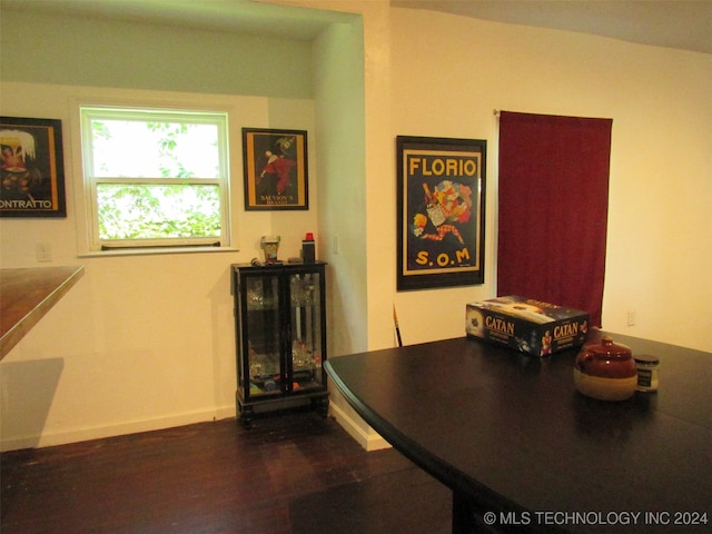 dining area with hardwood / wood-style floors