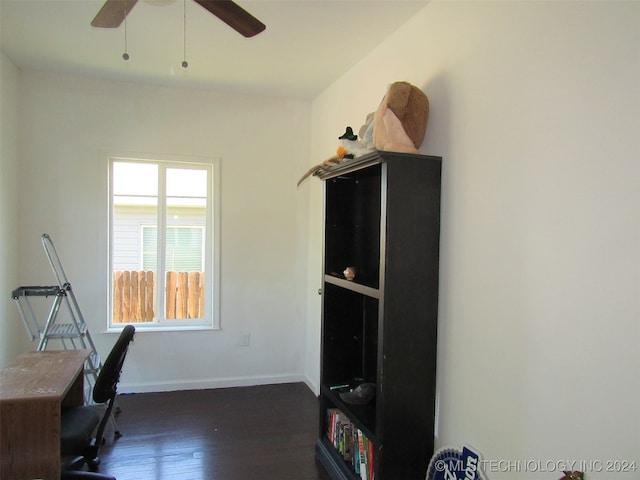 office area with ceiling fan and dark wood-type flooring