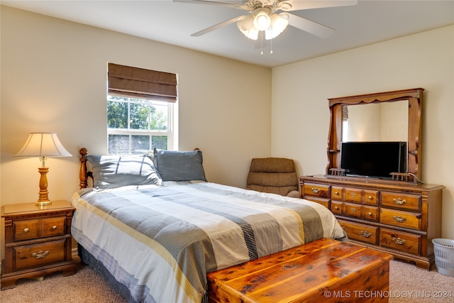 carpeted bedroom with ceiling fan