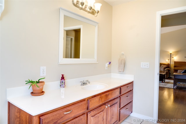 bathroom featuring wood-type flooring and vanity