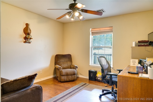 office area with ceiling fan and light hardwood / wood-style flooring