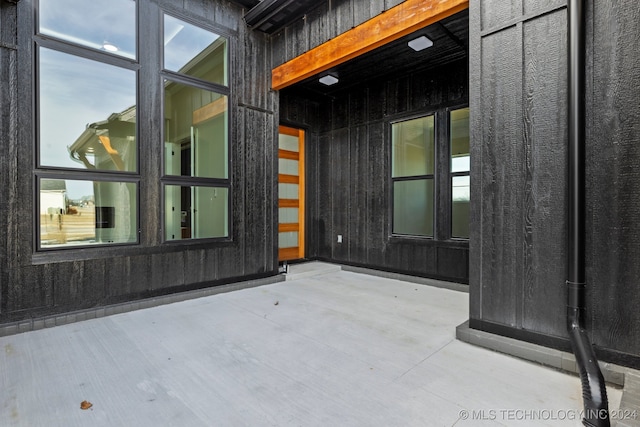 empty room with concrete flooring