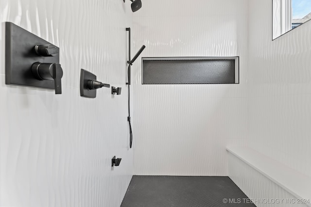 interior space featuring a tile shower