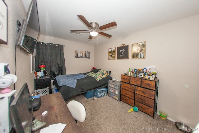 carpeted bedroom with ceiling fan