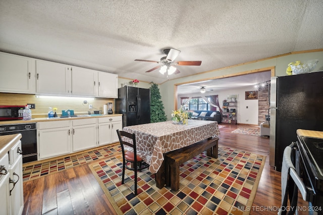 kitchen with black appliances, dark wood-type flooring, ceiling fan, and white cabinets