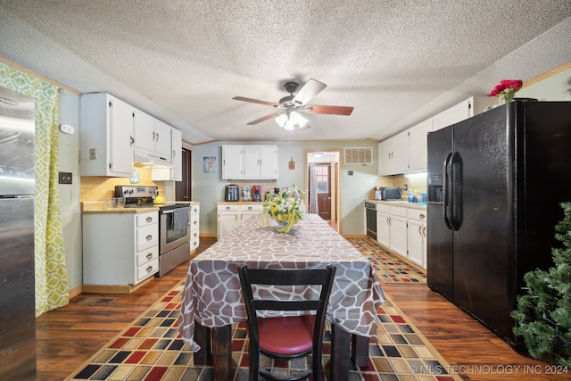 kitchen featuring black appliances, white cabinetry, and dark hardwood / wood-style floors