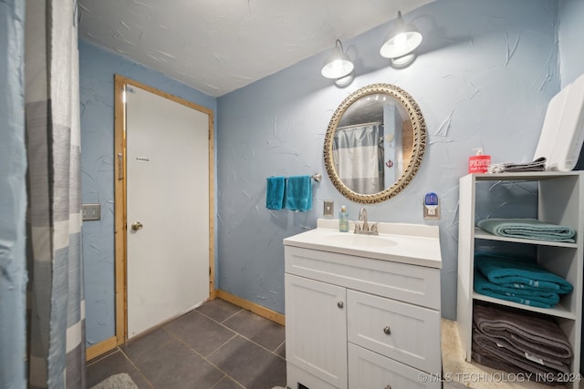 bathroom featuring vanity and tile patterned floors