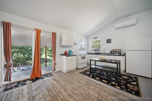 kitchen with white cabinetry, white appliances, lofted ceiling, sink, and a wall mounted AC