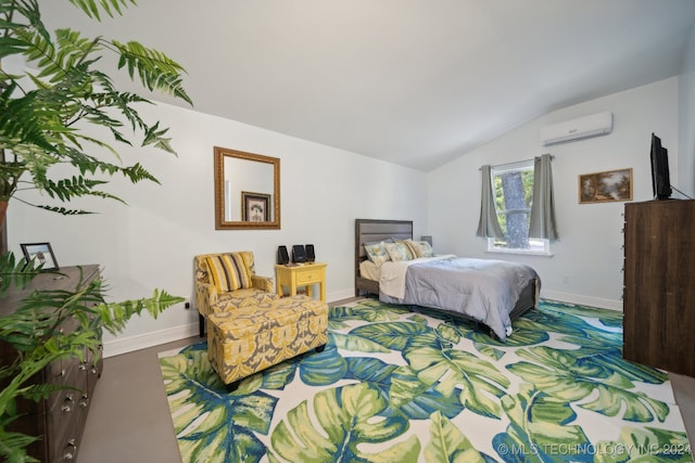 bedroom with lofted ceiling and a wall mounted AC