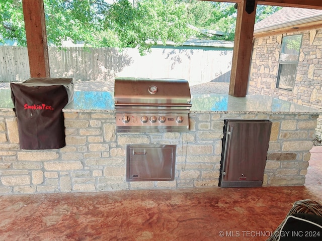 view of patio / terrace with a grill and exterior kitchen