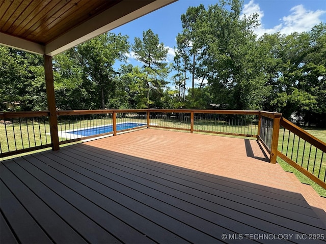 deck featuring a yard