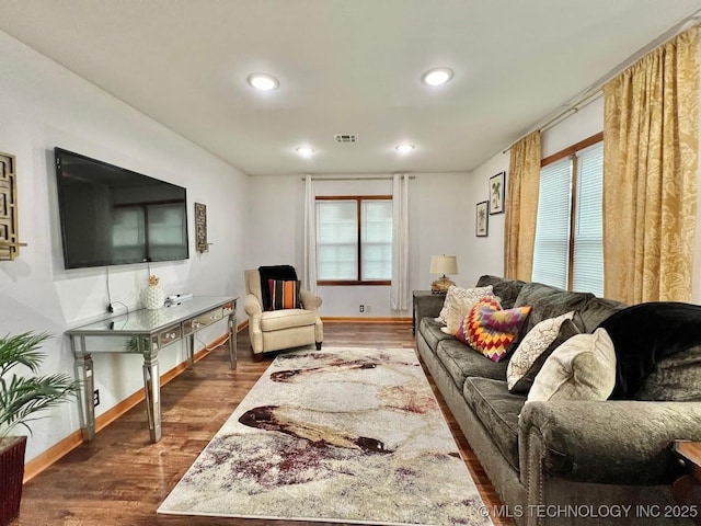 living room with dark hardwood / wood-style floors