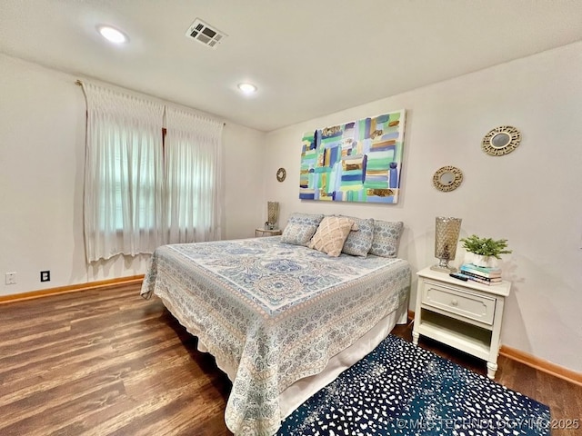 bedroom featuring hardwood / wood-style floors