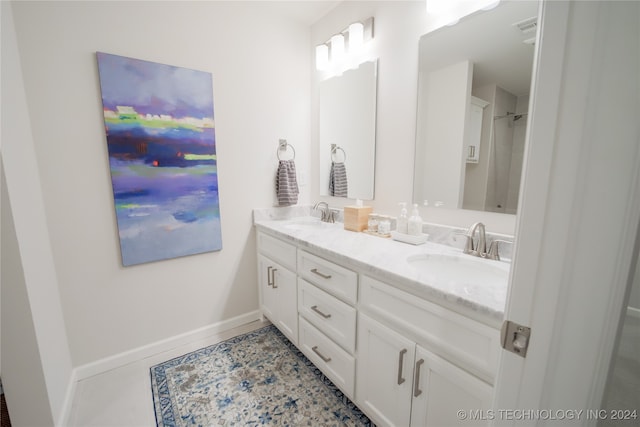 bathroom featuring vanity and tile patterned floors