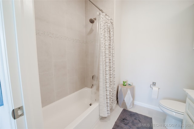 full bathroom with vanity, tile patterned flooring, toilet, and shower / bath combo