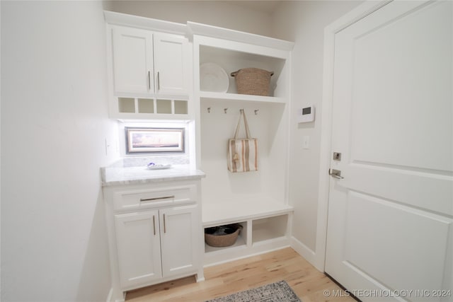 mudroom with light wood-type flooring