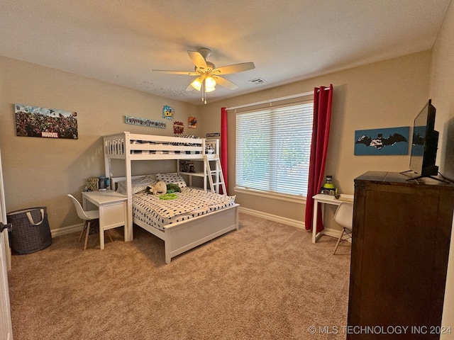 bedroom with light carpet and ceiling fan