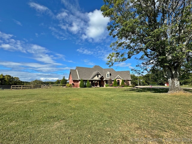 view of front of property with a front lawn