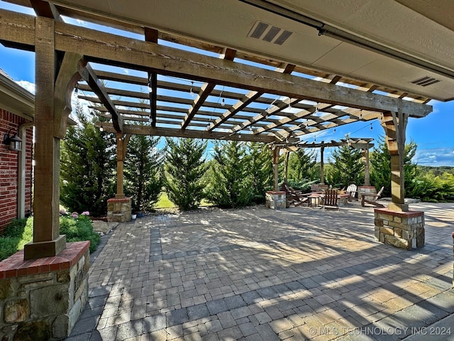 view of patio featuring a pergola