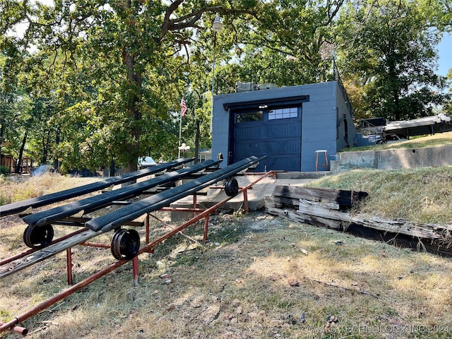 view of outbuilding featuring a garage