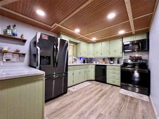 kitchen with wood ceiling, black appliances, green cabinets, light hardwood / wood-style floors, and decorative backsplash