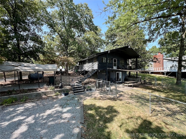 exterior space featuring a carport