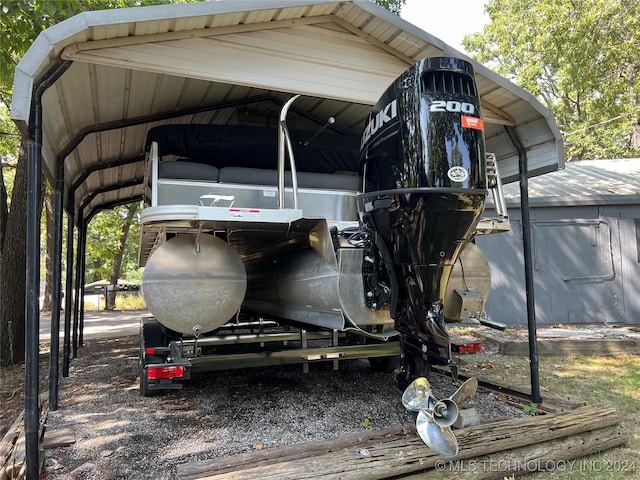 view of vehicle parking featuring a carport